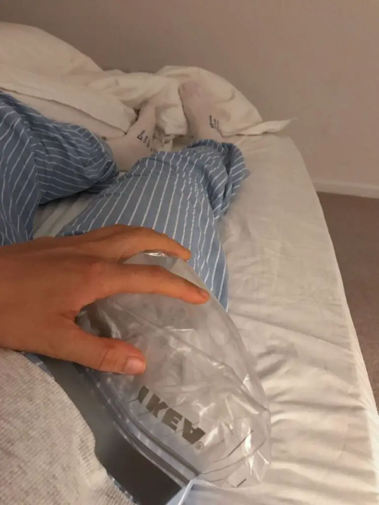 Zoe tehrani icing her right hip after doing post op rehab