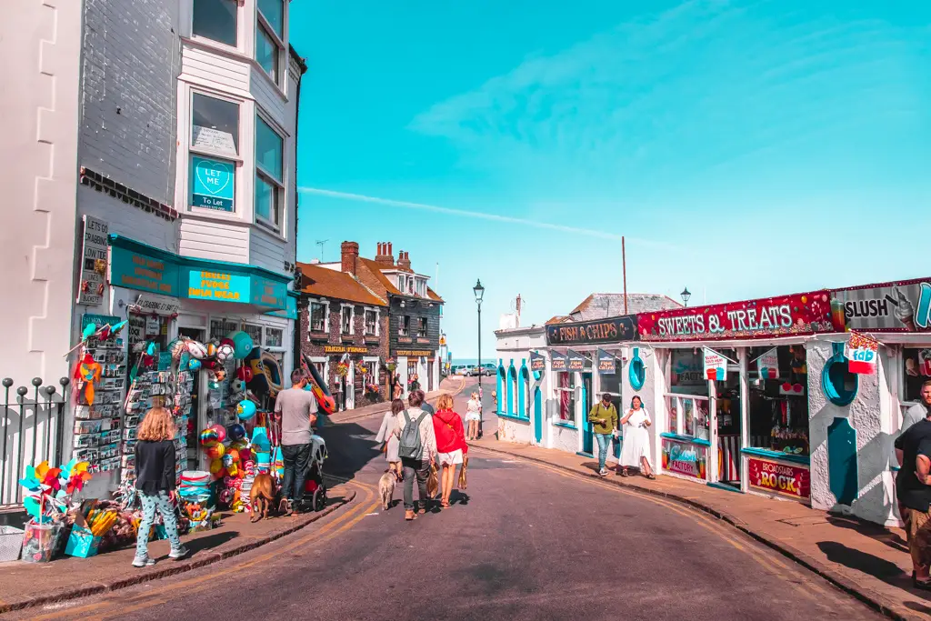 Broadstairs town with lots of people walking and retro shops.