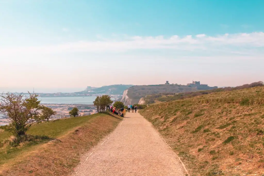 The England coast path leading back towards dover in the distance on a sunny day.