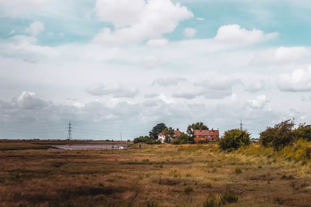 Two houses in a large field on the walk from Faversham to Whitstable. 