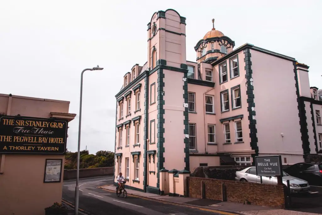 The Belle Vue hotel with a cyclist in front