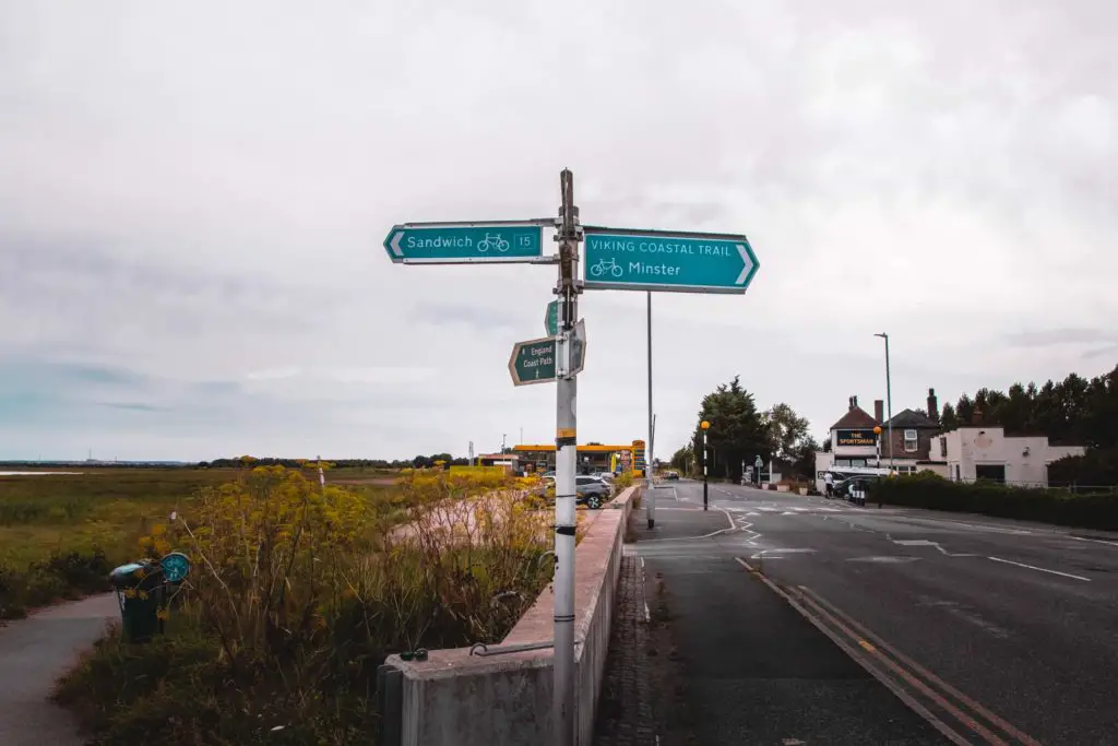 Signage pointing left to Sandwich and right for the viking coastal trail on the walk from Ramsgate to Sandwich.