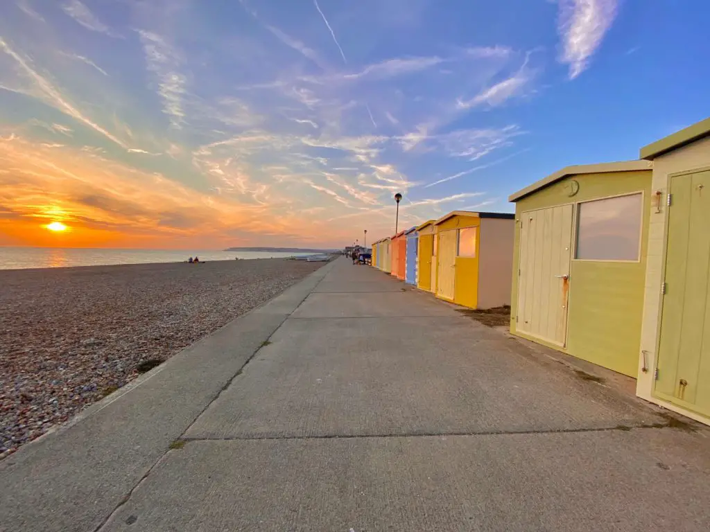 Beach huts in Seaford at sunset