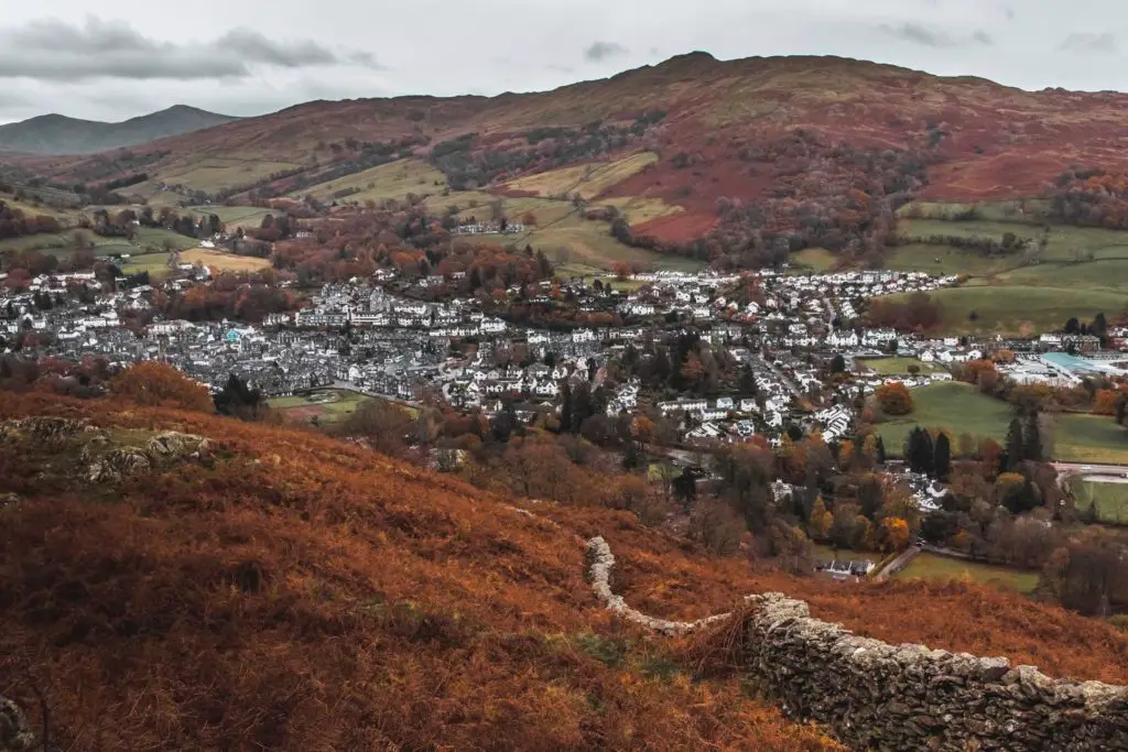 A view down to the white buildings of Ambleside in the valley. 