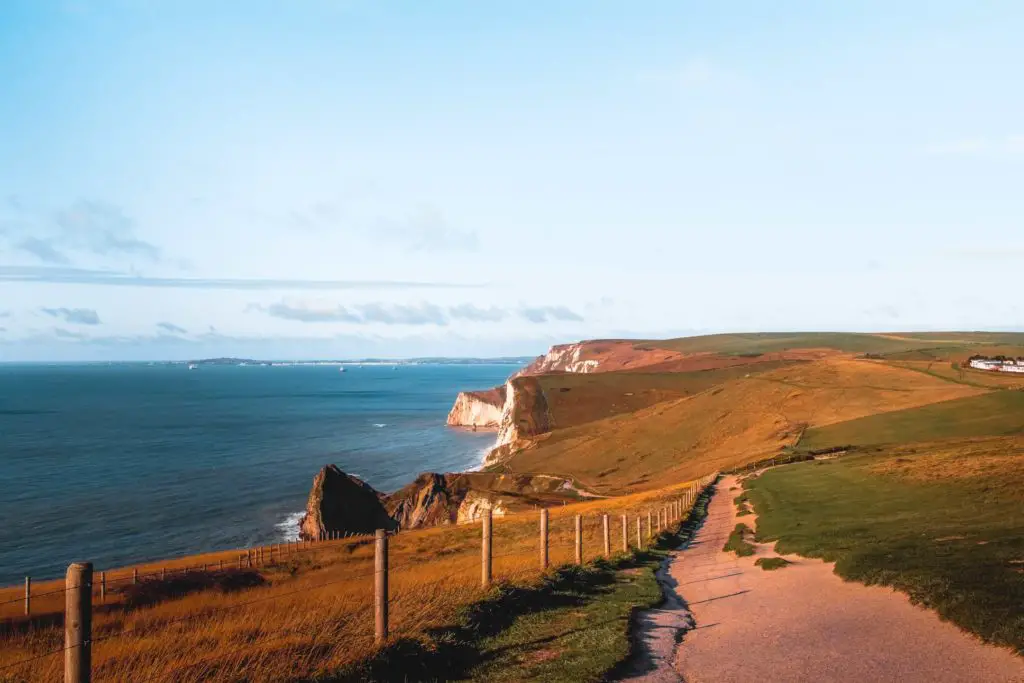 A trail along the cliffy coastline on the walk from Lulworth Cove to Durdle Door.