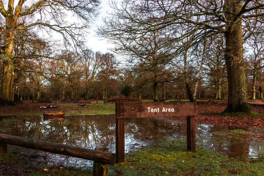 A water filled tent area in Hollands wood.