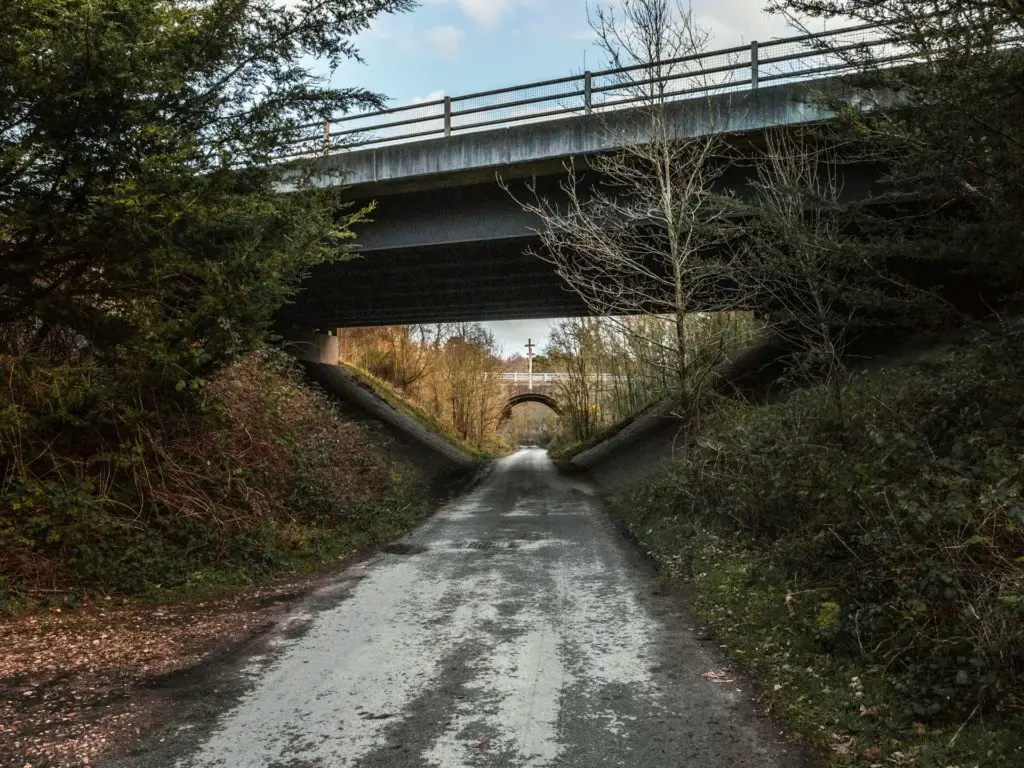 The road leading under two bridges. 