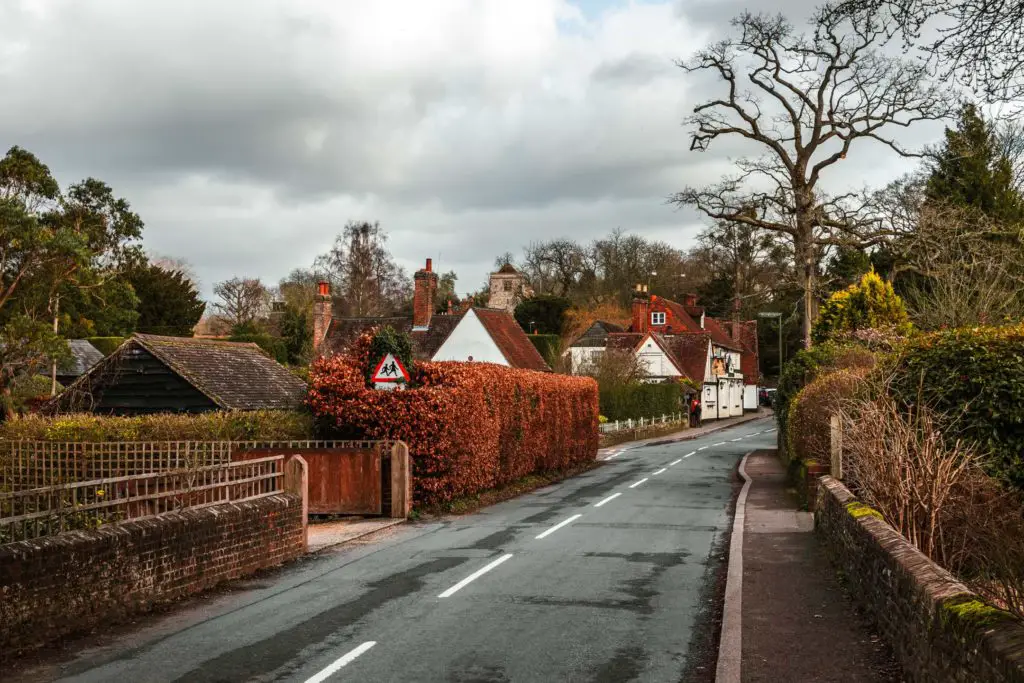 A road leading through the residential area of Puttenham on the walk from Farnham to Guildford along the North Downs way.