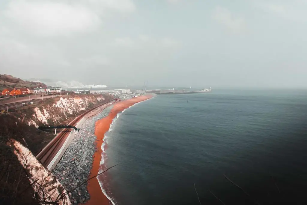 View over Dover with the railway line running next to the beach. 