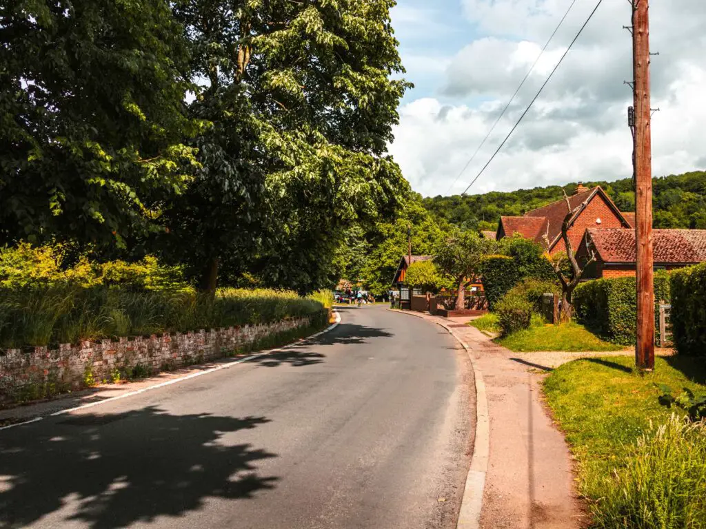 The road as it curves round into the village of Aldbury in the Chilterns.