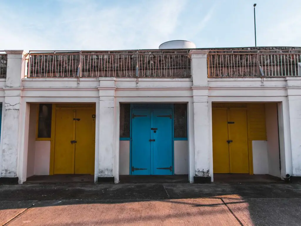 Colourful doors build into white concrete at Westgate on Sea.