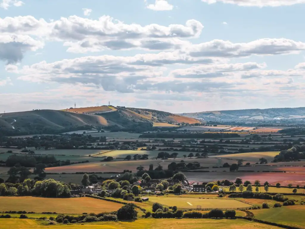 A view of the fields of the South Downs and the hills to the left on the circular walk from Hassocks to Devils Dyke.