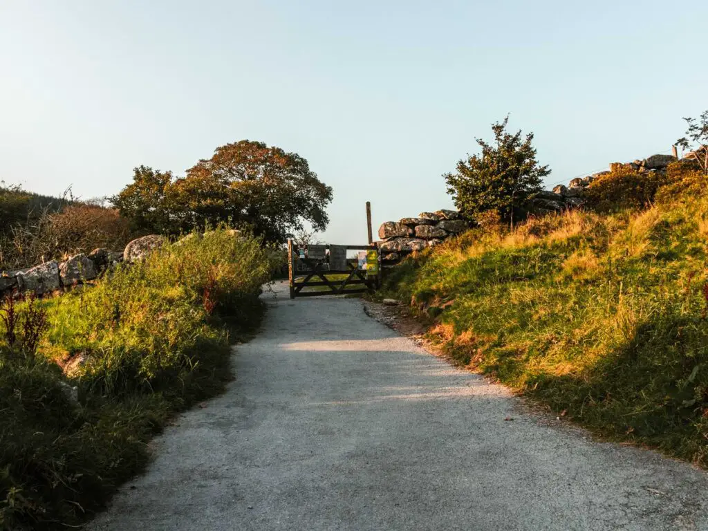 The start of the trail and gate entrance of the Wistman's Wood walk in Dartmoor.