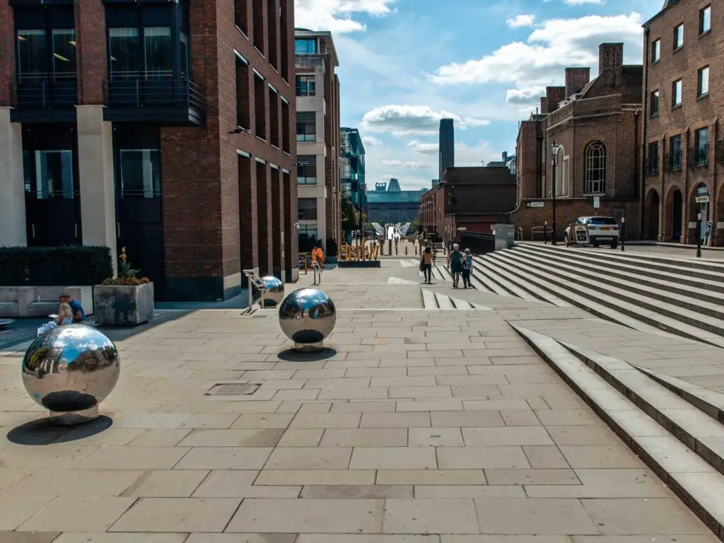 A pedestrian square with ball art installations on the Jubilee walk around the City of London.