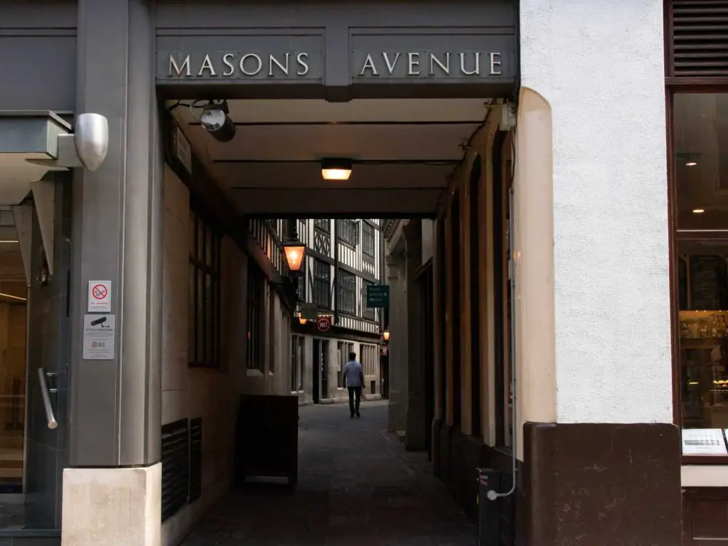 The narrow passageway of Masons Avenue on the walk around the City off London.