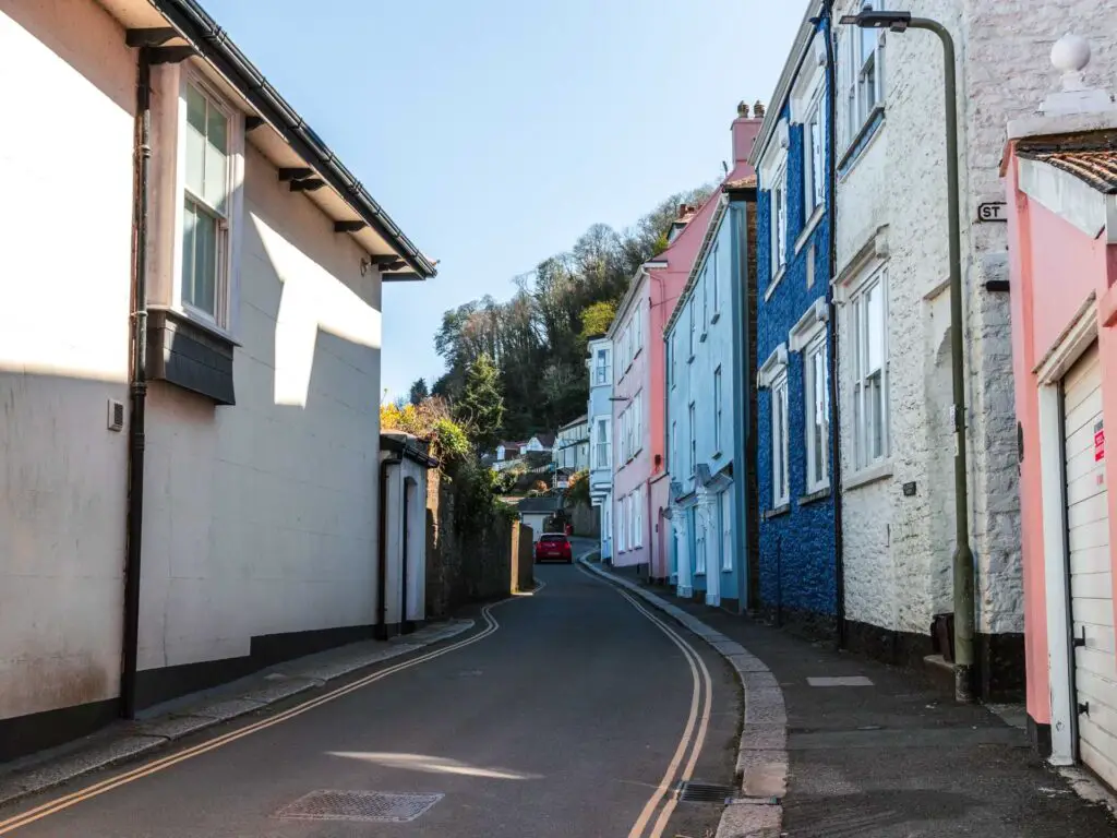 A road lined with colourful buildings in Dartmouth.