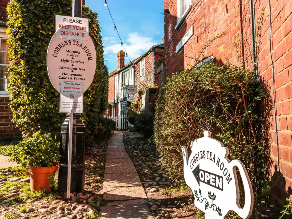 A stone path over cobblestones leading to a tea room on Rye.