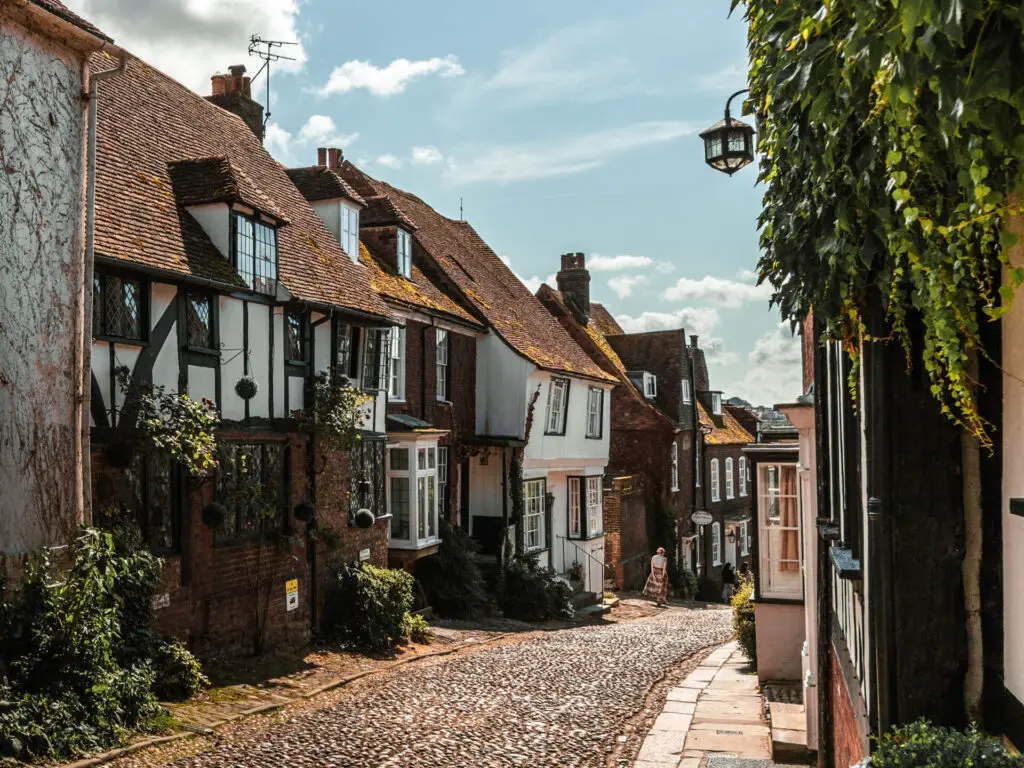 The quaint old houses of mermaid street on a walk around Rye in East Sussex.