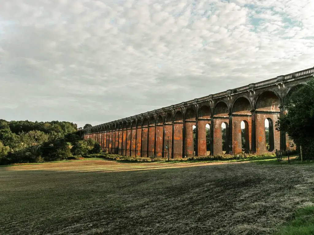 Looking across the field to the impressive arches of the ouse valley viaduct, on the circular walk from the ardingly reservoir and now towards Balcombe.