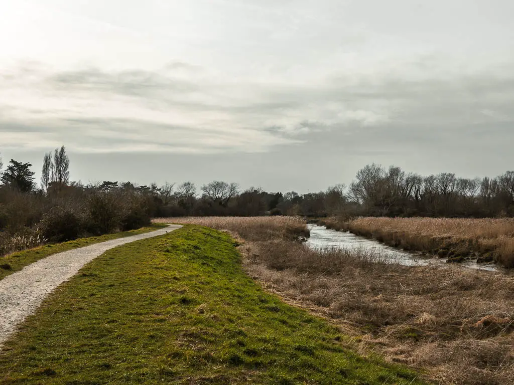 A winding trail along the ridge, with the bank leading down to the river Stour.