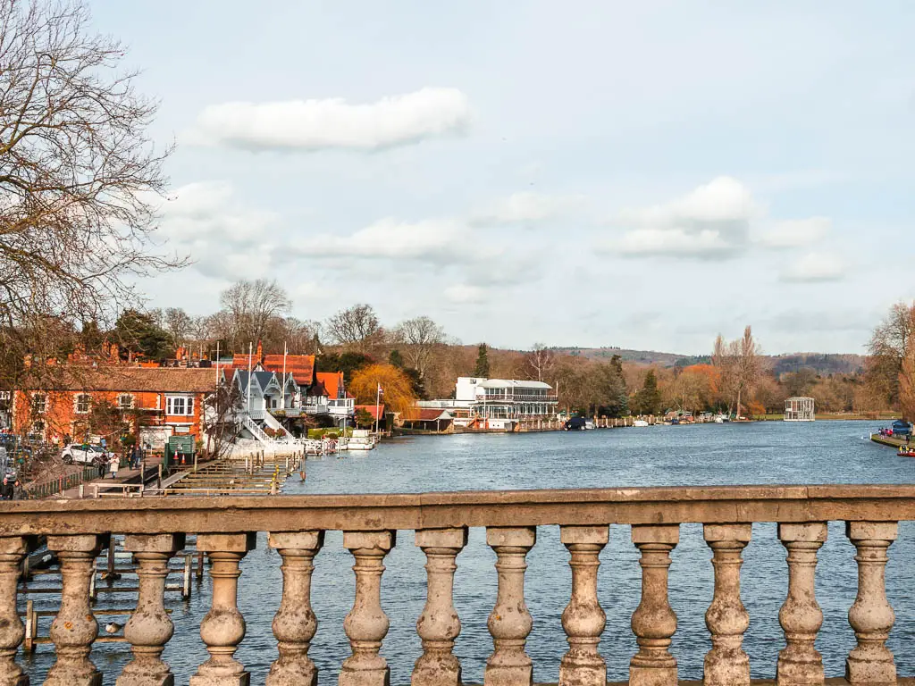 Standing on Henley Bridge looking past the railings to the river at the start of the walk to Marlow. 