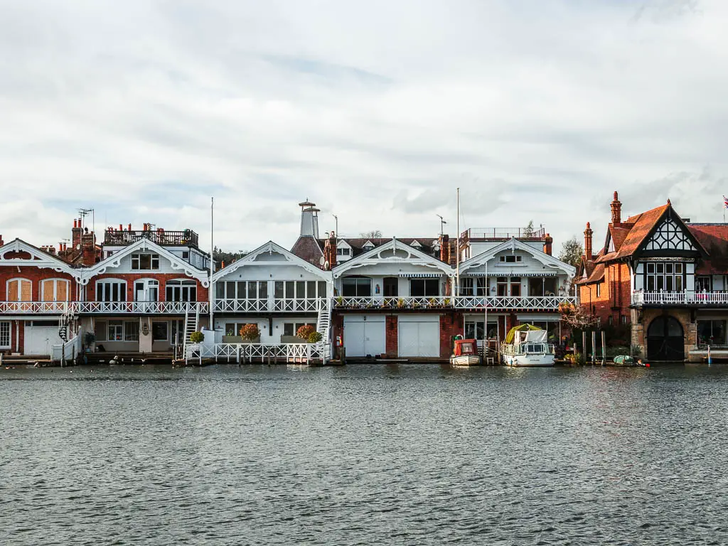 A row of houses across the River Thames in Henley on the walk towards Marlow.