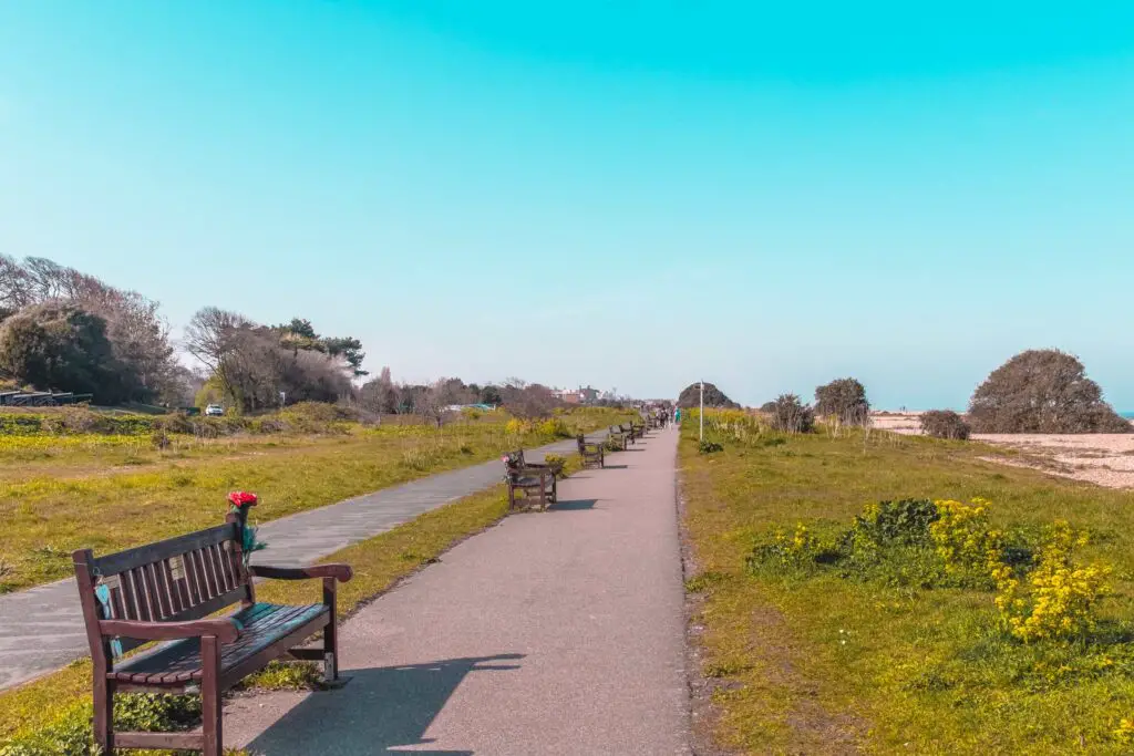 Memorial benches lining the path on the walk towards Deal. 