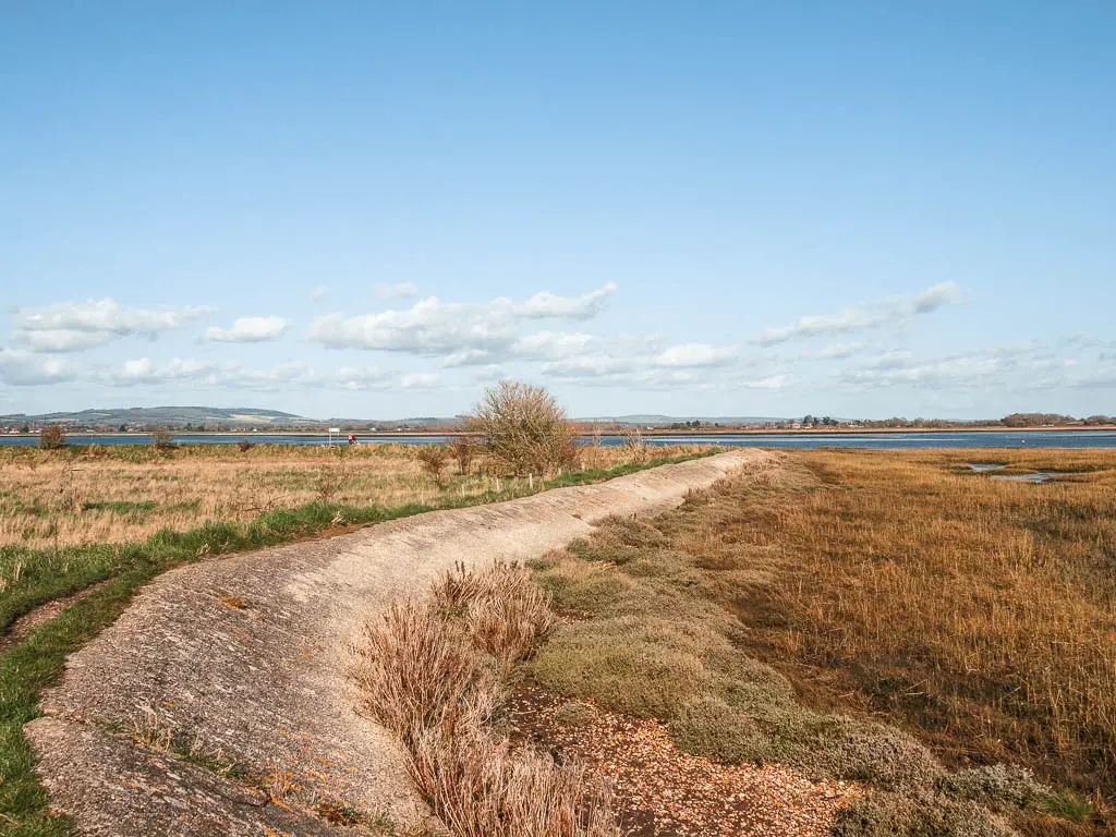 A concrete walking ridge as it curves around on Thorney Island.