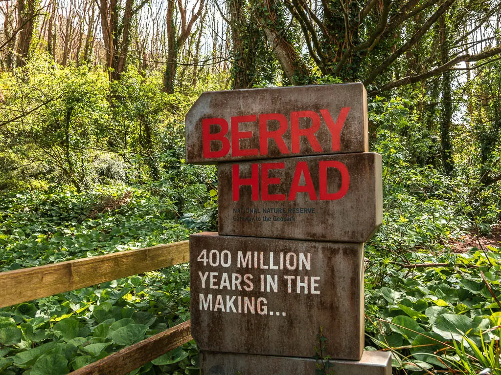 Stones stacked on top of each other which say 'Berry Head' on the walk from Brixham Harbour.