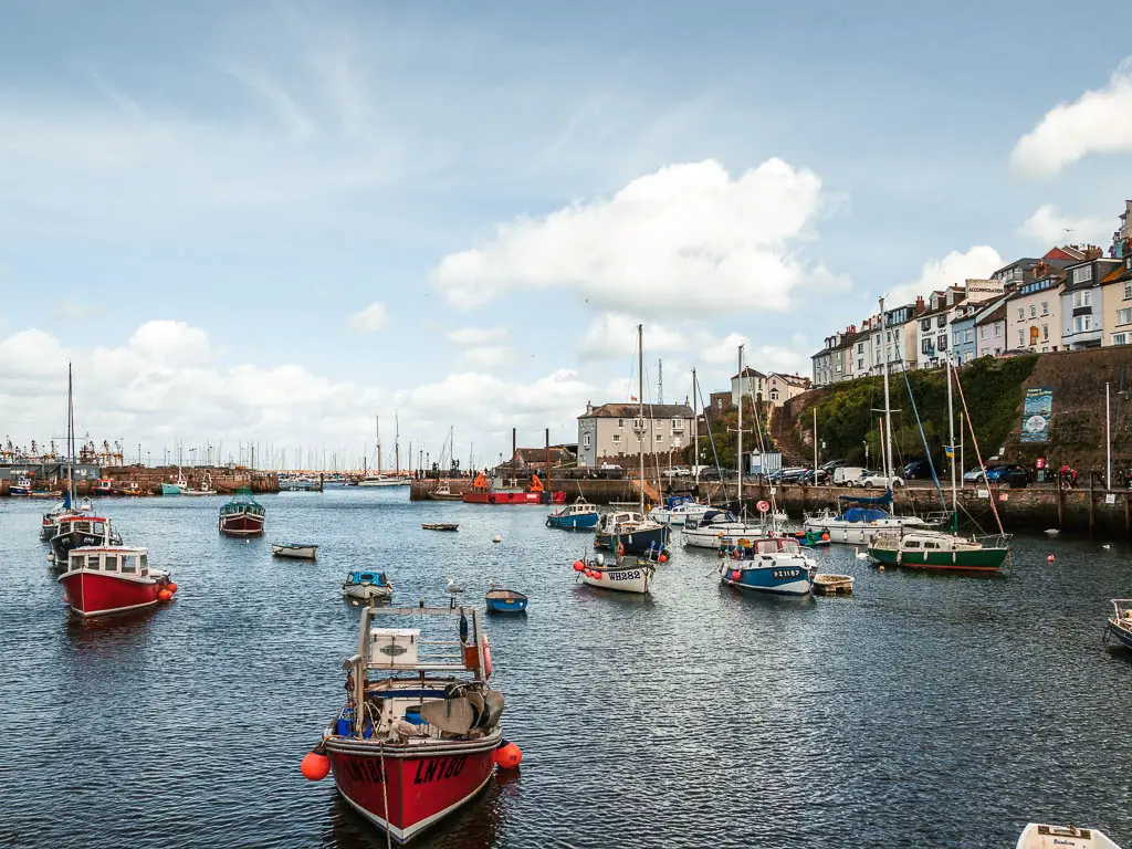 Brixham Harbour with lots of colourful boats at the start of the circular walk to Berry Head.