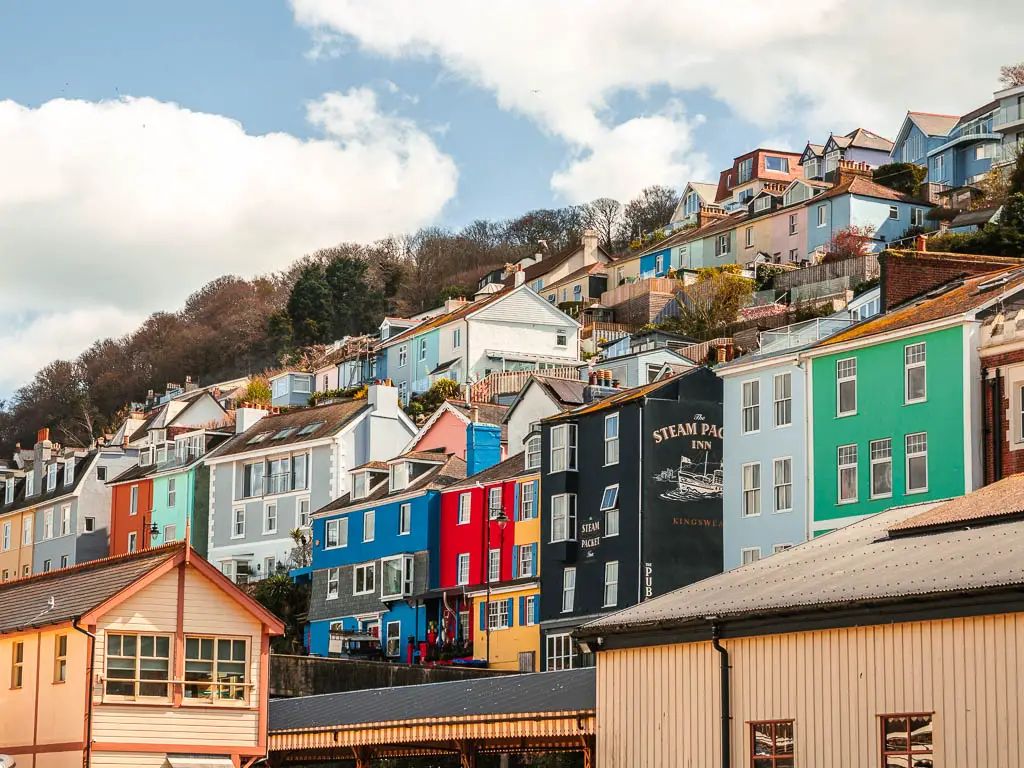 Looking up at the rows of colourful houses of Kingswear at the start of the walk to Greenway and Dittisham.