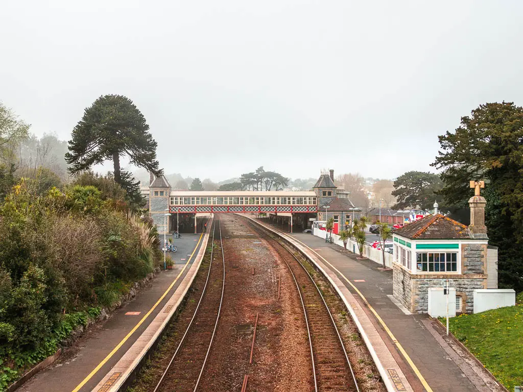 Looking along the railway tracks of Torquay Station at the start of the walk to Cockington.