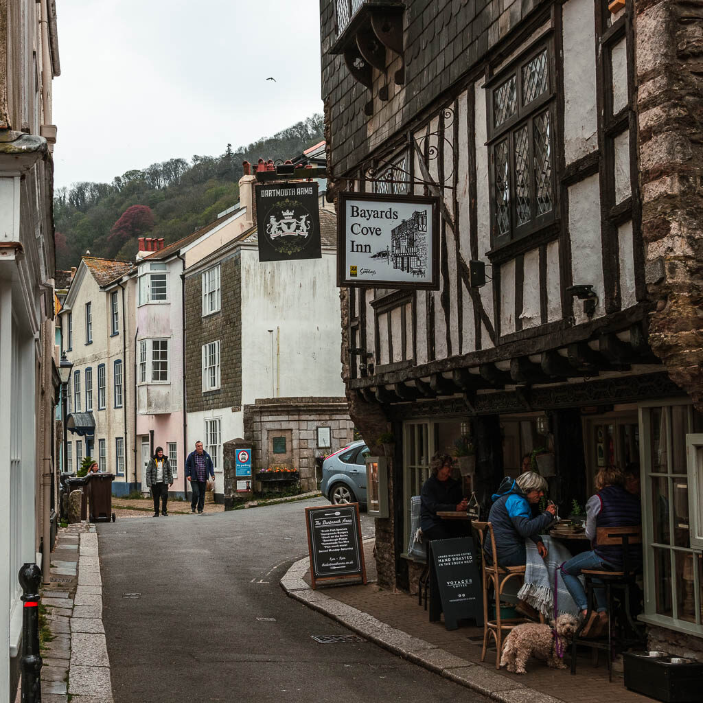 Looking along an alleyway with a Tudor pub in Dartmouth at the start of the walk to Blackpool Sands. 