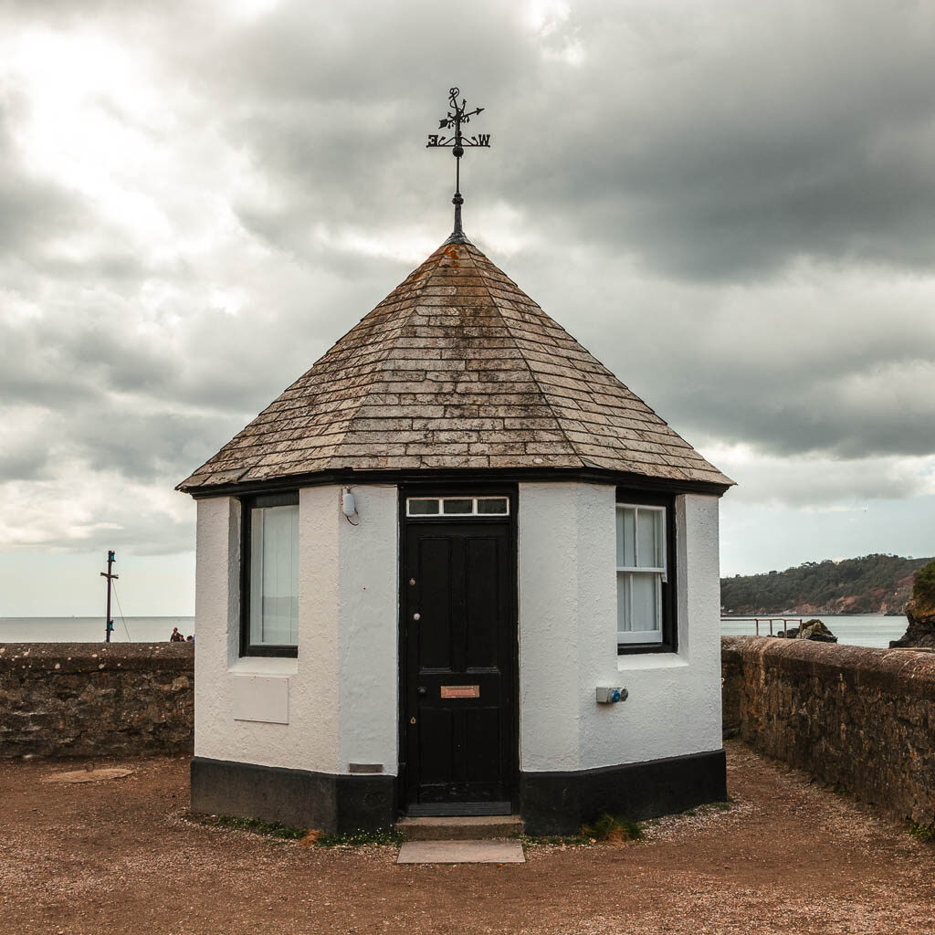 A small white circular hut.