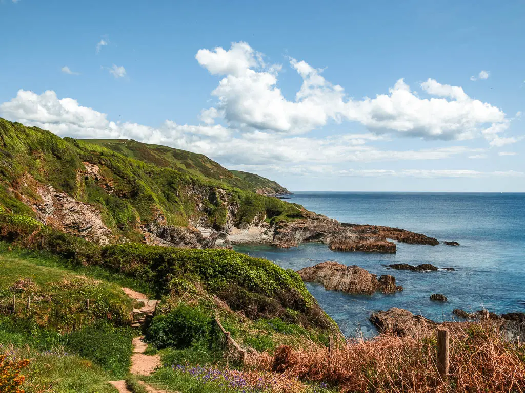 Looking along the undulating hills down the Lantivet Bay coastline on the Fowey to Polperro coastal walk.