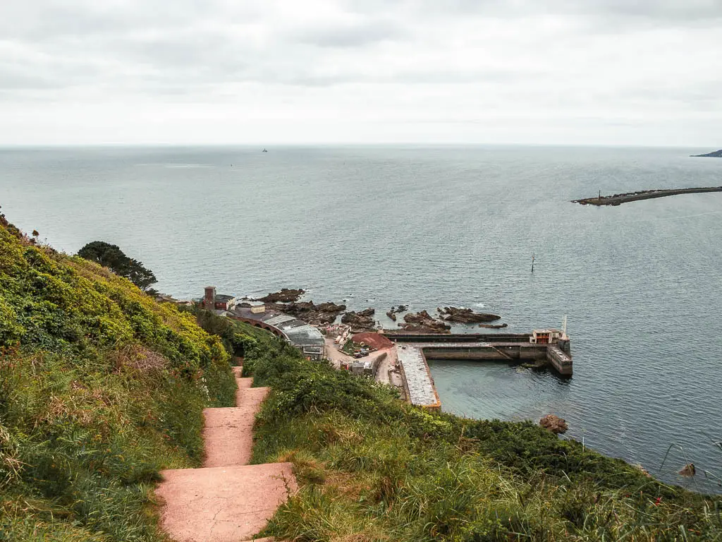 Looking down some steps towards the sea and some construction down below, on the coastal walk from Jennycliff to Bovisand. 