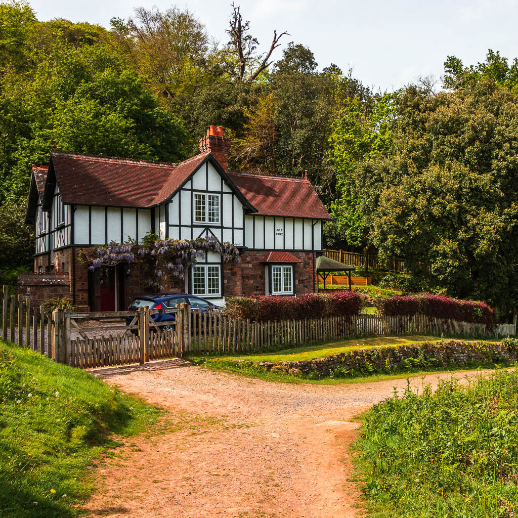 Looking along the path to a tudor house.