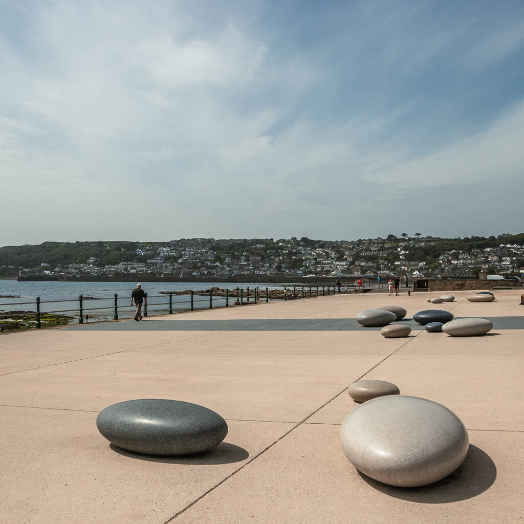 Large pebble art installations on the promenade on the walk from Penzance to Mousehole.