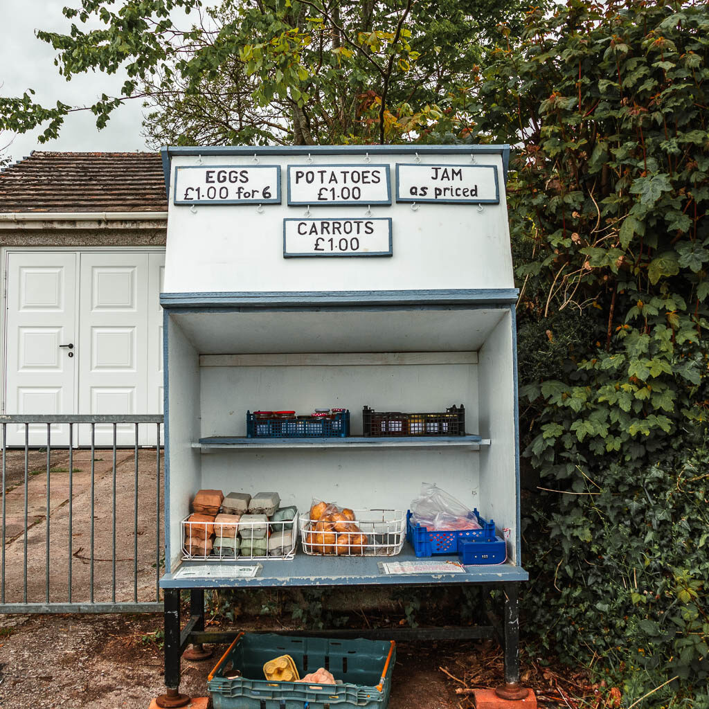 A container with shelves selling eggs.