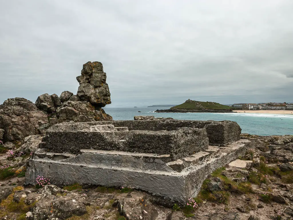 A WWII pillbox surround by rock at the start of the St Ives to Zennor walk along the coast path.