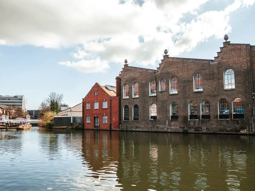 The canal, with warehouse buildings on the other side.