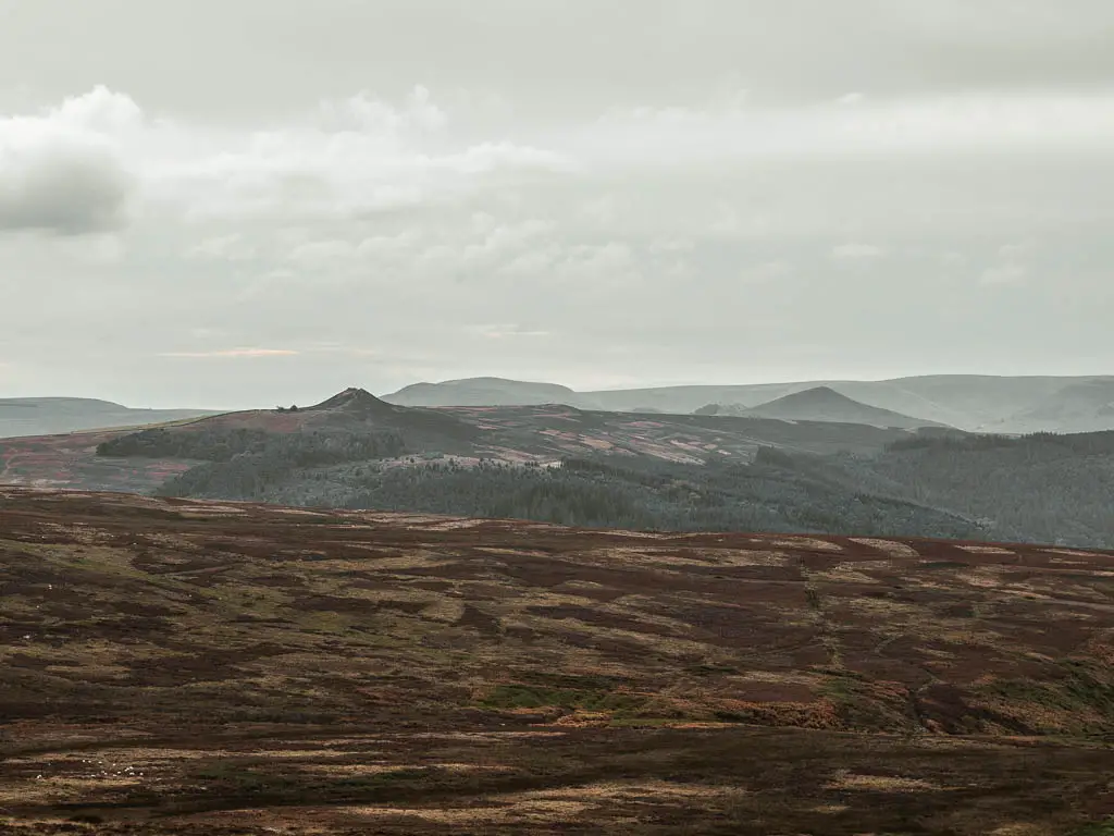 Looking across the large open moorland to some peaks in the distance on the circular Bamford Edge walk.