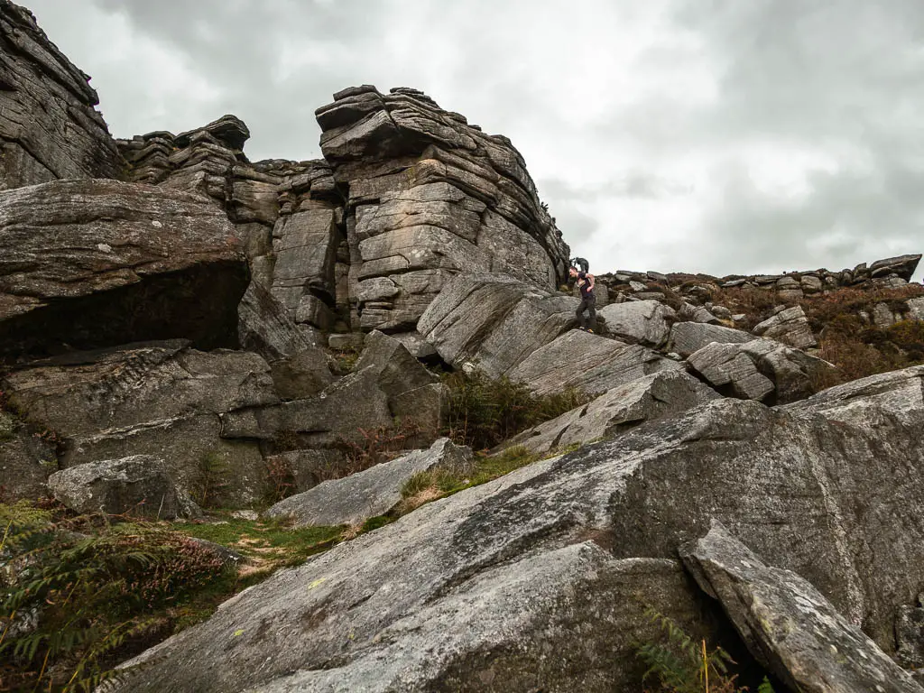 Looking up to big rocks.