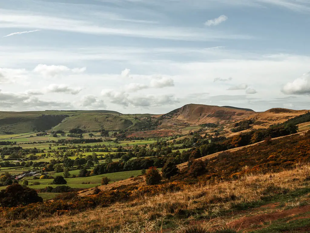 Looking across the hillside with a view to Mam Tor in the distance, on the walk down into the valley.