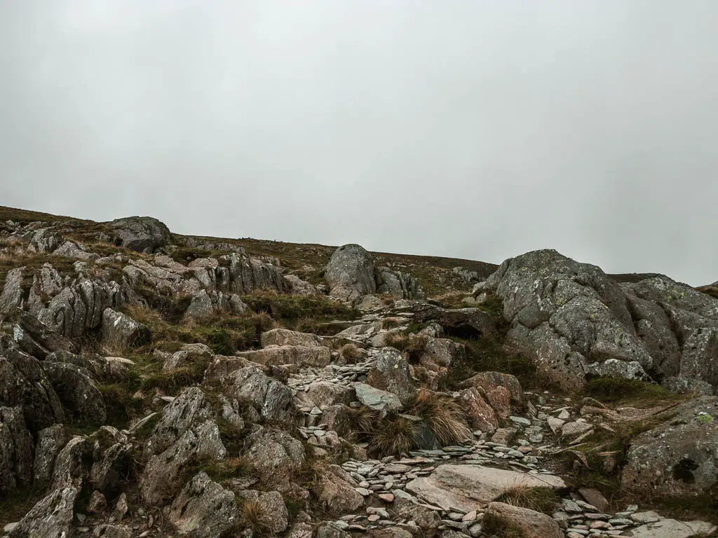 A mass of rocks leading uphill.