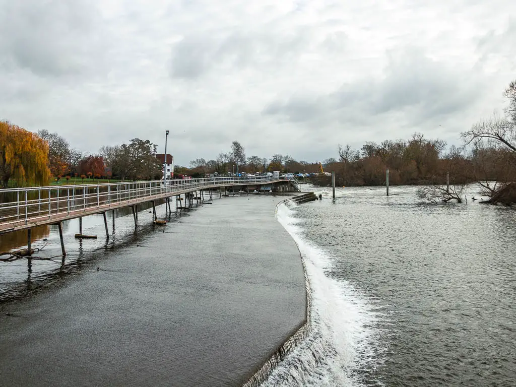 Looking along the wire with a bridge to the left along the Henley to Hambleden walk.