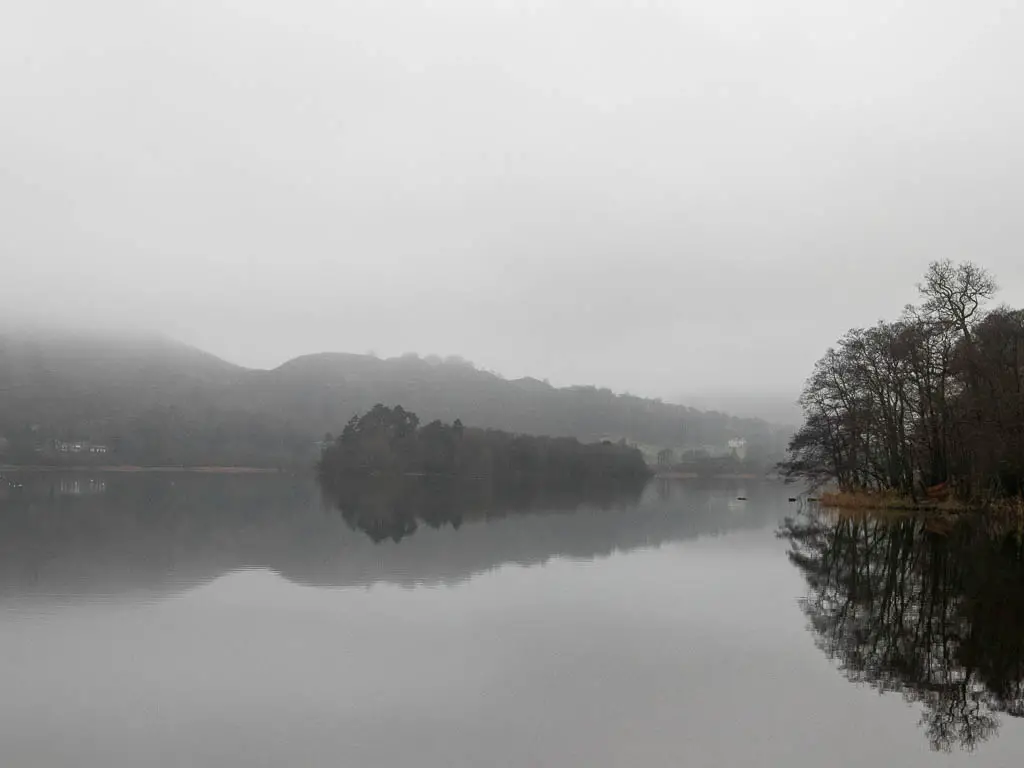 Looking across Grasmere on a foggy day on the circular walk around Rydal Water to Rydal Cave.