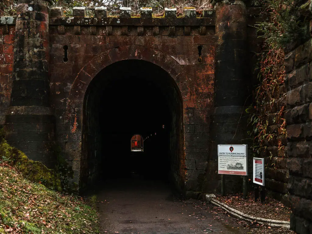 Looking through a dark tunnel to the light on the other side.