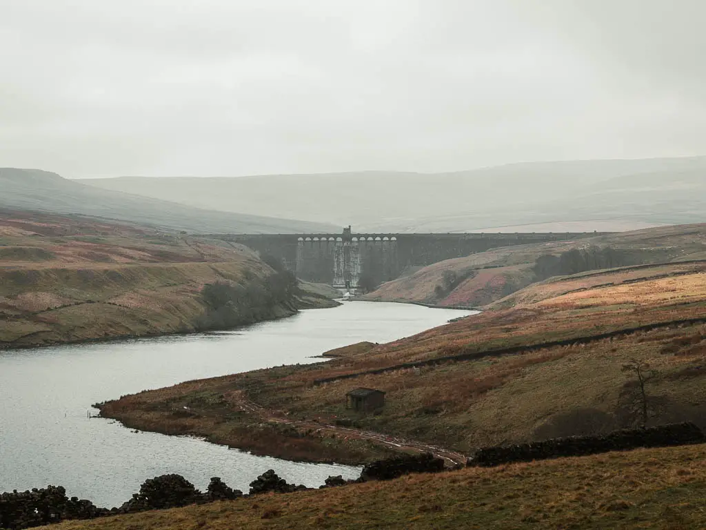 Looking down across the moor to the Scar House Reservoir, and the Angram Dam on the other side, part way along the circular walk.