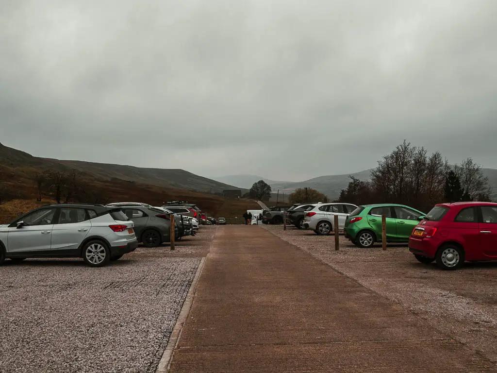 The car park with lots of parked cars.